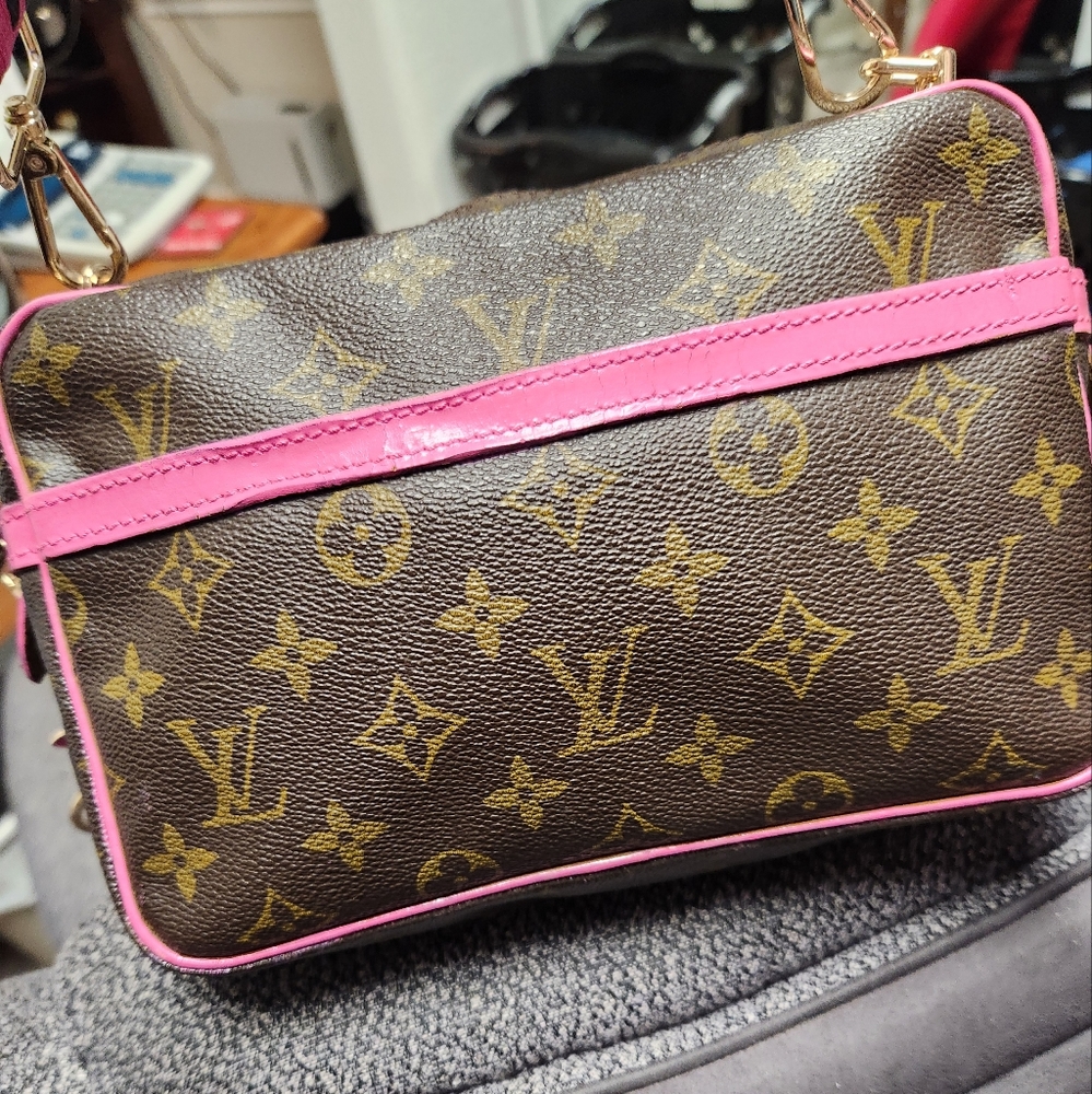 Louis Vuitton monogrammed clutch crossbody handbag